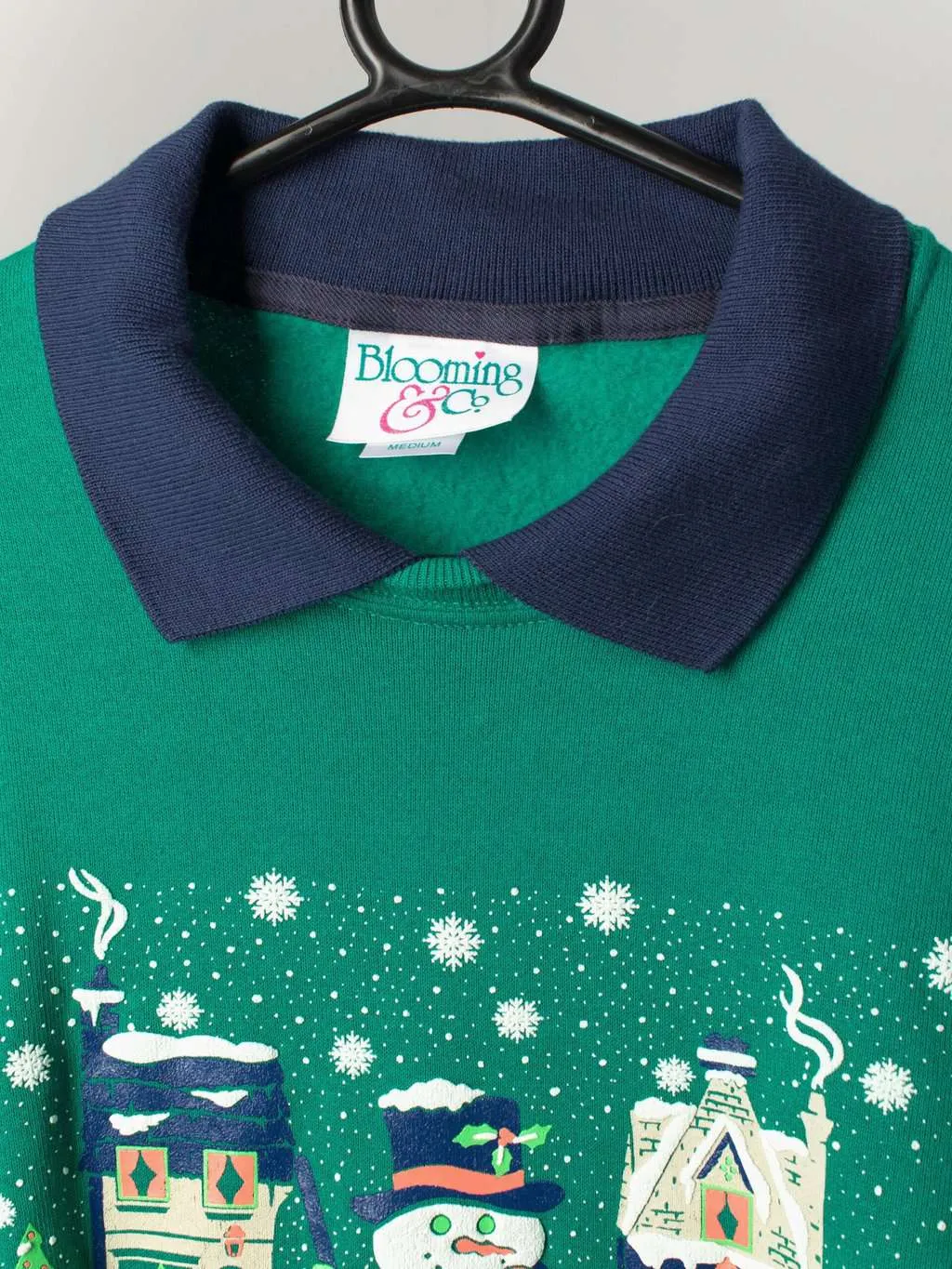 Vintage Christmas novelty sweater green with snowman street scene. Made in USA  – Medium / Large